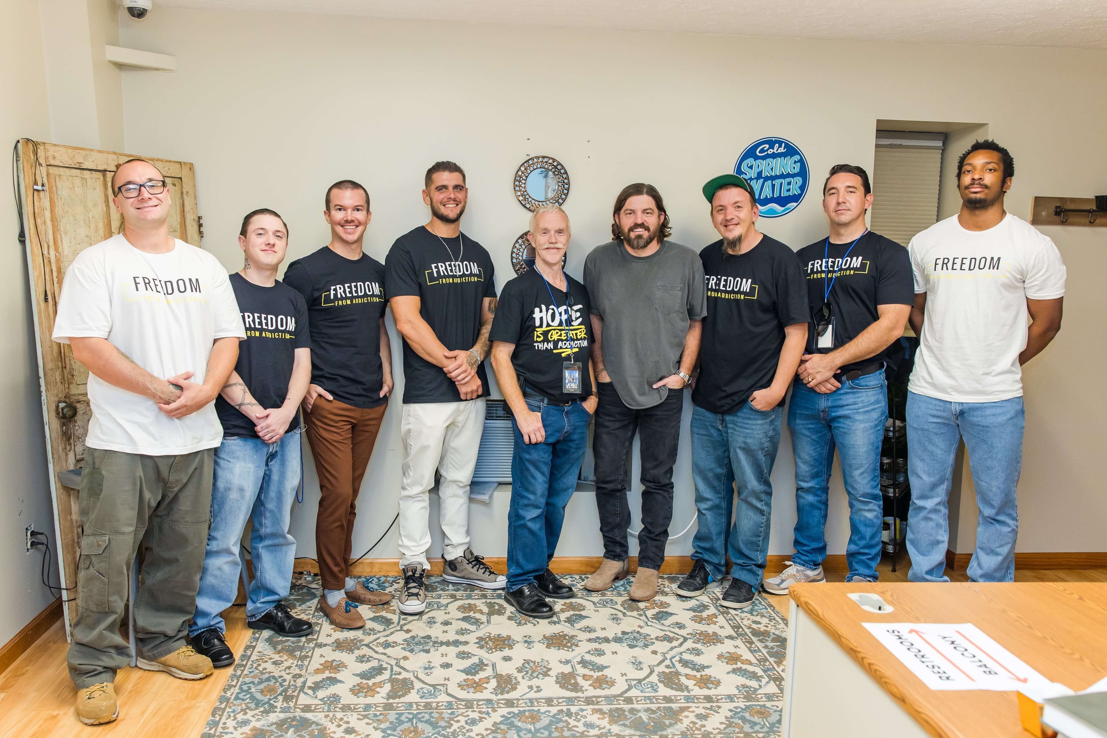 Josh Baldwin backstage with Shenandoah Valley Teen Challenge students in Freedom From Addiction shirts at Destiny Family Center in Stuart Draft, Virginia